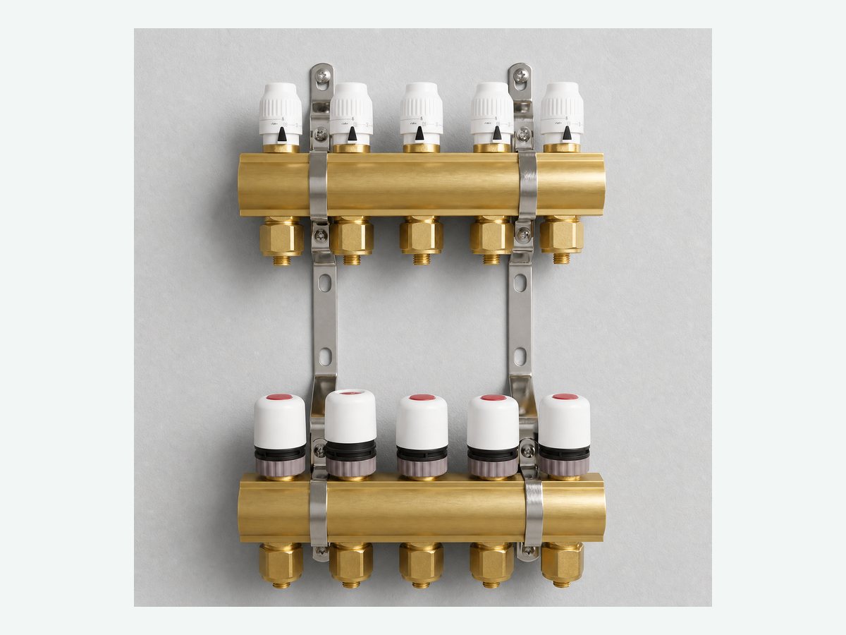 Brass manifold with white thermostatic caps