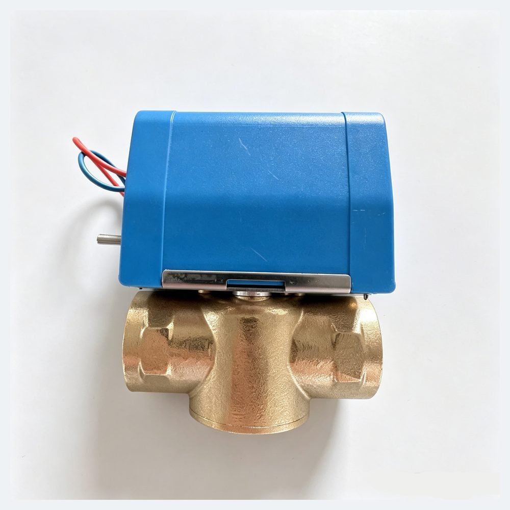 Blue actuator and three-port brass valve front view